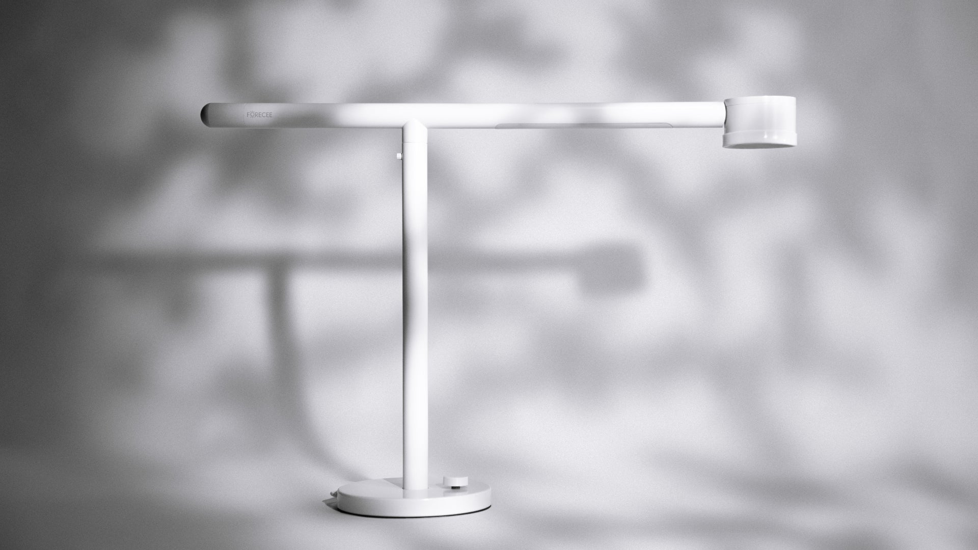 Modern white Forecee Beauty Lamp casting shadows on a light gray background