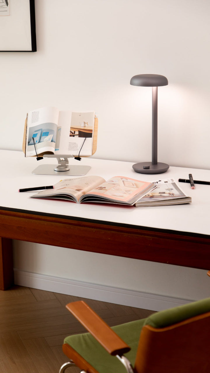 Forecee Desk Lamp lighting an open book on a modern desk setup, ideal for reading or study.